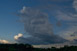 Haufenwolke im Schatten der krftigen Gewitterzelle am Abend