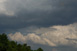 Eine kleine Funnelcloud an der Wolkenbasis