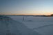 Ein klarer Blick nach Sden zur Alpenkette zur Abenddmmerung, auf dem Heimweg