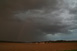 Nach Osten abziehendes Gewitter mit Regenbogenansatz