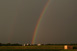 Durchgehender Regenbogen an der Rckseite der Gewitterzelle