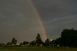 Durchgehender Regenbogen an der Rckseite der Gewitterzelle