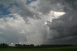 Rckseite der Gewitterzelle in stlicher Richtung, Regenbogen weiterhin sichtbar